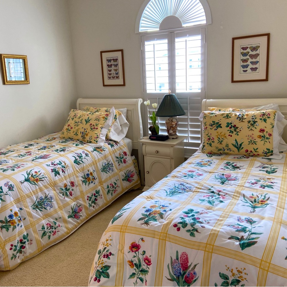 Twin Liz at Home comforters  w/skirts/shams. reverse is check. Floral skirt